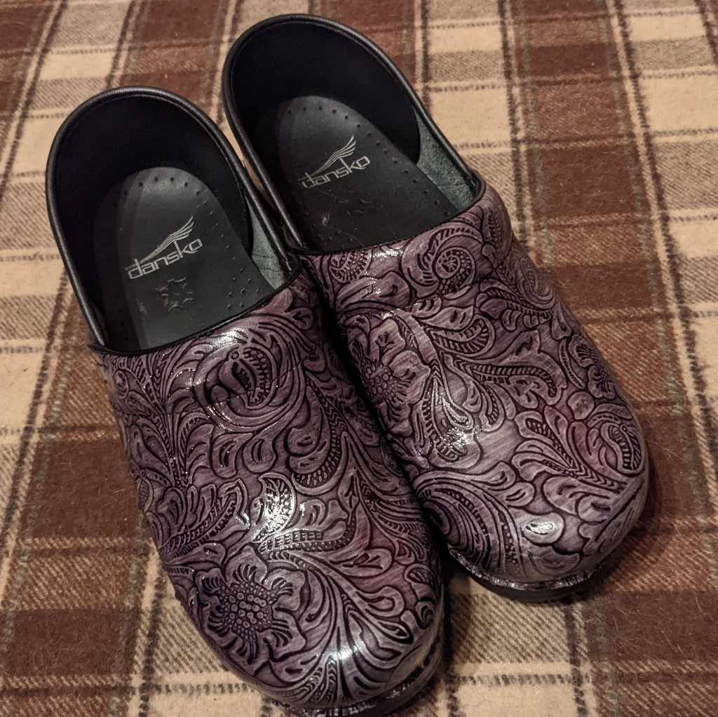 Lovely Silver And Black Dansko Clogs